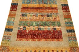 Backside of handmade New Persian Gabbeh rug showing knot structure and weave density