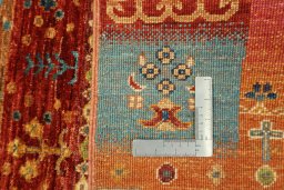 Backside of handmade New Persian Gabbeh rug showing knot structure and weave density