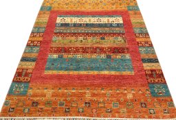 Surface texture of New Persian Gabbeh rug with natural Wool and intricate pattern