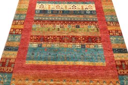 Backside of handmade New Persian Gabbeh rug showing knot structure and weave density