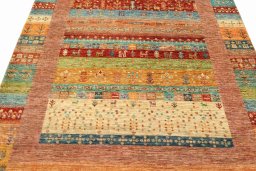 Backside of handmade New Persian Gabbeh rug showing knot structure and weave density