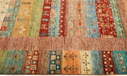 Full view of New Persian Gabbeh rug from Pakistan, 245 × 174 cm in Red tones
