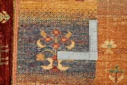 Surface texture of New Persian Gabbeh rug with natural Wool and intricate pattern
