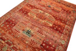 Backside of handmade New Persian Gabbeh rug showing knot structure and weave density