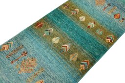 Backside of handmade New Persian Gabbeh rug showing knot structure and weave density