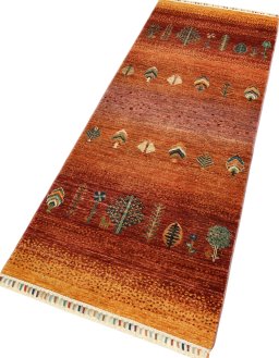 Corner detail of New Persian Gabbeh rug showing border pattern and Wool pile