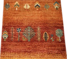 Backside of handmade New Persian Gabbeh rug showing knot structure and weave density