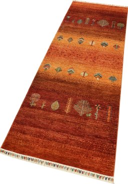 Corner detail of New Persian Gabbeh rug showing border pattern and Wool pile
