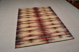 Corner detail of New Persian Gabbeh rug showing border pattern and Wool pile