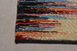 Backside of handmade New Persian Gabbeh rug showing knot structure and weave density