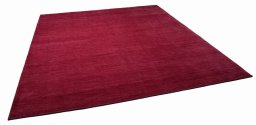 Corner detail of New Persian Gabbeh rug showing border pattern and Wool pile