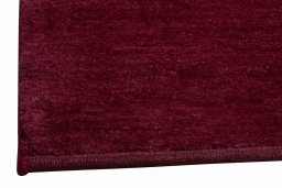 Backside of handmade New Persian Gabbeh rug showing knot structure and weave density