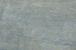 Backside of handmade New Persian Gabbeh rug showing knot structure and weave density