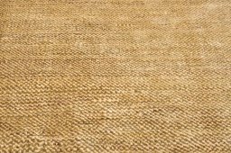 Backside of handmade New Persian Gabbeh rug showing knot structure and weave density