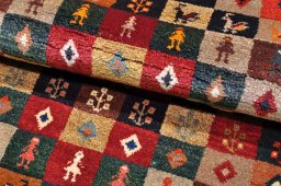Central medallion detail of 2000s Persian Gabbeh rug from Iran / Persia