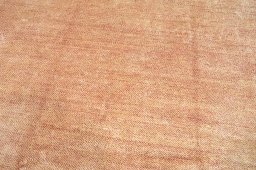 Backside of handmade New Persian Gabbeh rug showing knot structure and weave density