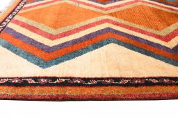 Central medallion detail of 2000s Persian Gabbeh rug from Iran / Persia