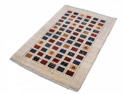 Close-up detail of 2000s Persian Gabbeh rug from Iran / Persia showing Wool weave
