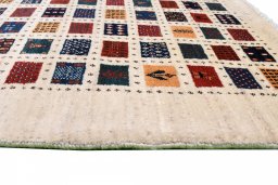 Close-up detail of 2000s Persian Gabbeh rug from Iran / Persia showing Wool weave