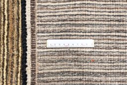Close-up detail of 2000s Persian Gabbeh rug from Iran / Persia showing Wool weave