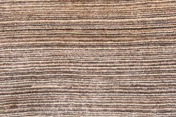 Backside of handmade 2000s Persian Gabbeh rug showing knot structure and weave density