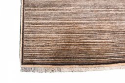 Full view of 2000s Persian Gabbeh rug from Iran / Persia, 225 × 125 cm in Beige tones