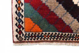 Full view of 2000s Persian Gabbeh rug from Iran / Persia, 197 × 119 cm in Multi Color tones