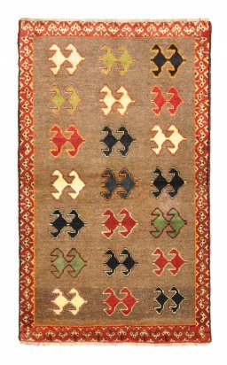 Full view of 2000s Persian Gabbeh rug from Iran / Persia, 142 × 85 cm in Brown tones