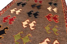 Central medallion detail of 2000s Persian Gabbeh rug from Iran / Persia