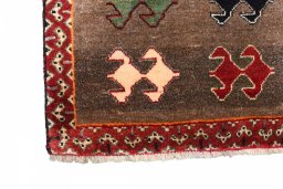 Full view of 2000s Persian Gabbeh rug from Iran / Persia, 142 × 85 cm in Brown tones
