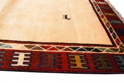 Close-up detail of 2000s Persian Gabbeh rug from Iran / Persia showing Wool weave