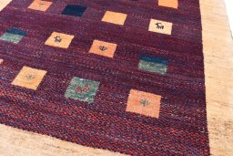 Central medallion detail of 2000s Persian Gabbeh rug from Iran / Persia