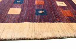 Close-up detail of 2000s Persian Gabbeh rug from Iran / Persia showing Wool weave