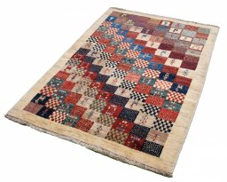 Close-up detail of 2000s Persian Gabbeh rug from Iran / Persia showing Wool weave