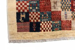 Close-up detail of 2000s Persian Gabbeh rug from Iran / Persia showing Wool weave