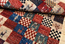 Full view of 2000s Persian Gabbeh rug from Iran / Persia, 151 × 109 cm in Multi Color tones