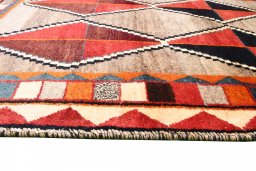 Close-up detail of 2000s Persian Gabbeh rug from Iran / Persia showing Wool weave