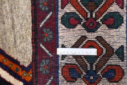 Close-up detail of 2000s Persian Gabbeh rug from Iran / Persia showing Wool weave