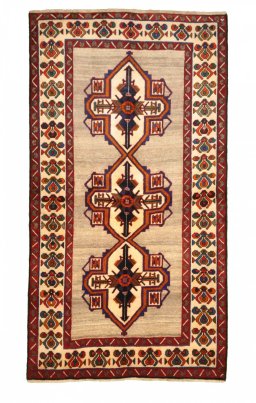 Full view of 2000s Persian Gabbeh rug from Iran / Persia, 256 × 142 cm in Beige tones