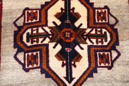 Backside of handmade 2000s Persian Gabbeh rug showing knot structure and weave density
