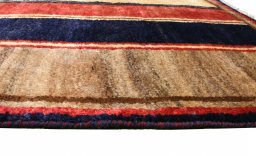 Full view of 2000s Persian Gabbeh rug from Iran / Persia, 201 × 101 cm in Multi Color tones