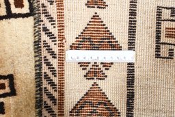 Close-up detail of 2000s Persian Gabbeh rug from Iran / Persia showing Wool weave