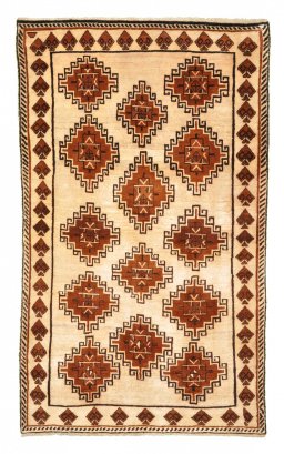 Full view of 2000s Persian Gabbeh rug from Iran / Persia, 198 × 118 cm in Beige tones