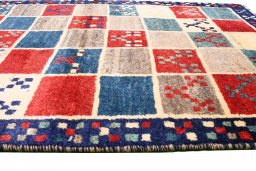 Central medallion detail of 2000s Persian Gabbeh rug from Iran / Persia