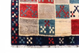 Close-up detail of 2000s Persian Gabbeh rug from Iran / Persia showing Wool weave