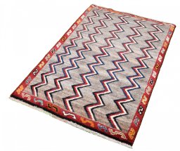 Close-up detail of 2000s Persian Gabbeh rug from Iran / Persia showing Wool weave