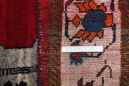 Close-up detail of 2000s Persian Gabbeh rug from Iran / Persia showing Wool weave