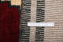 Close-up detail of 2000s Persian Gabbeh rug from Iran / Persia showing Wool weave