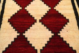 Central medallion detail of 2000s Persian Gabbeh rug from Iran / Persia