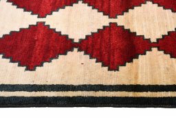Close-up detail of 2000s Persian Gabbeh rug from Iran / Persia showing Wool weave